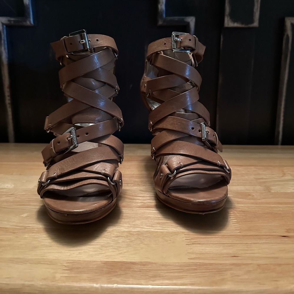 Michael Kors brown leather zip up heels. Size 7
